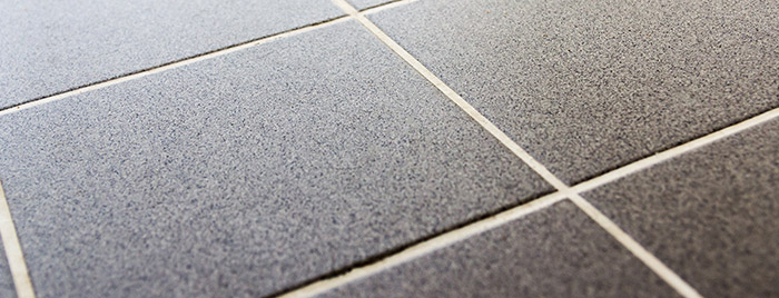 gray tiled floor in perspective background